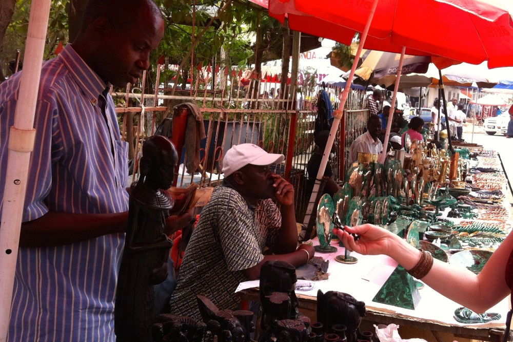 (September 2013) Buying trinkets at an outdoor market in Lubumbashi