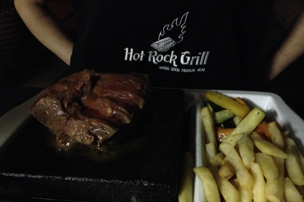 (February) Valentine's Day dinner at the former company-sponsored South African restaurant about 30 minutes away, where you could cook your steak on a hot stone