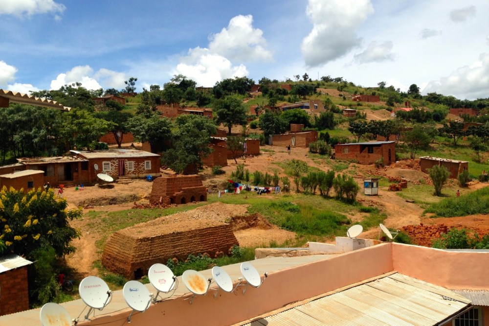 Such as this green, hilly neighborhood (notice the brick-making furnaces behind the hotel's satellite dishes)...