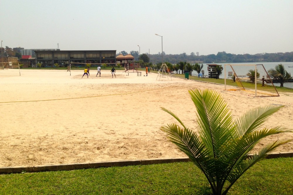 and this volleyball court by the lake, in between at least two fancy/expensive restaurants (my favorite goat joint is across the lake).
