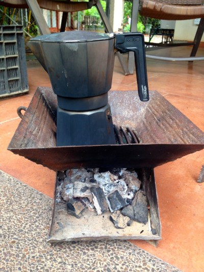 (Feb 2015) After an all-morning power outage, resorting to making my coffee over hot coals.