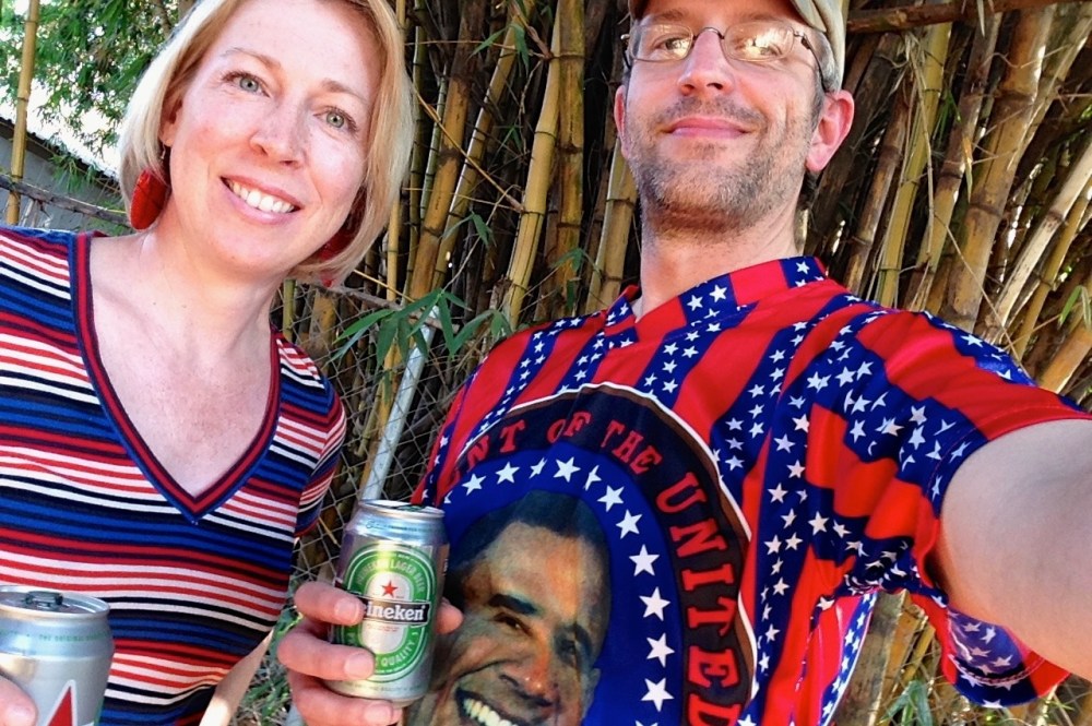 (July 2015) Seb and I celebrating USA's independence day with beer, hot dogs, and crazy fashion purchased in Fungurume back in 2010.