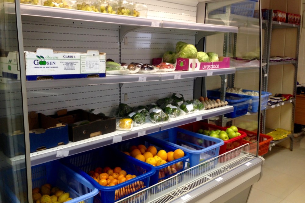 Compare the featured photo at the top, taken in Arizona in 2013, to this, the produce department of our one and only grocery store in town. (And this is on a good day, just after a delivery.)