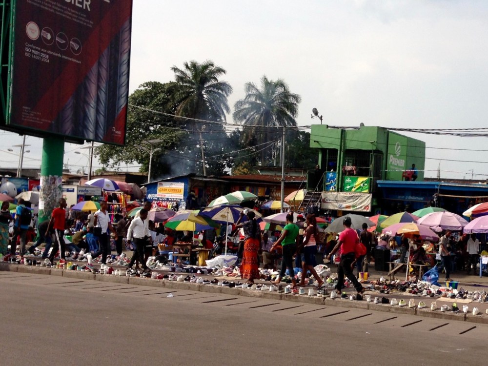 A busy marketplace for shoes and other things…