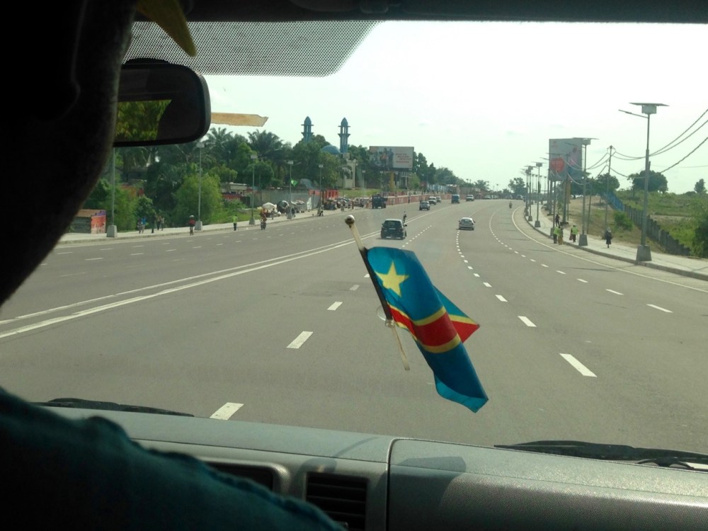 Our first glimpse of Kinshasa, a city of 12 million people. Turns out this new 8-lane freeway that runs between the airport and the president's palace and nowhere else is designed to fool foreigners like us into being impressed -- which it did.